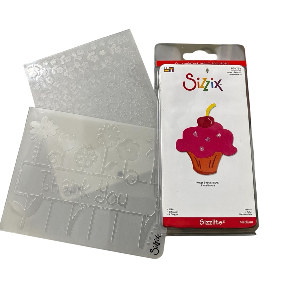 This is a Sizzix Sizzlits Die Cupcake with Floral, Thank You embossing folders